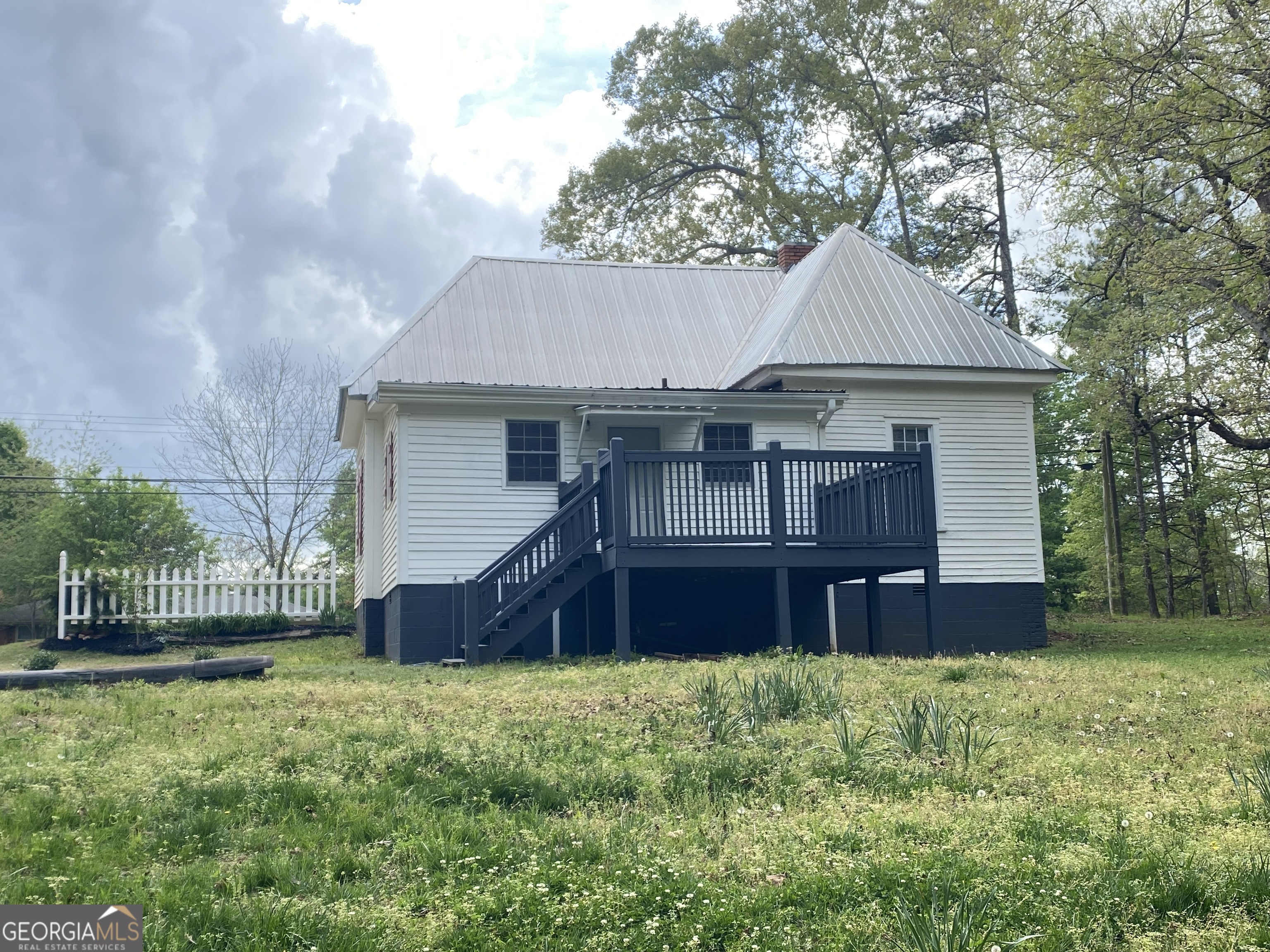 164 Glenn Carrie Road Hull, GA 30646 - Photo 35 of 43 a house view with a garden space