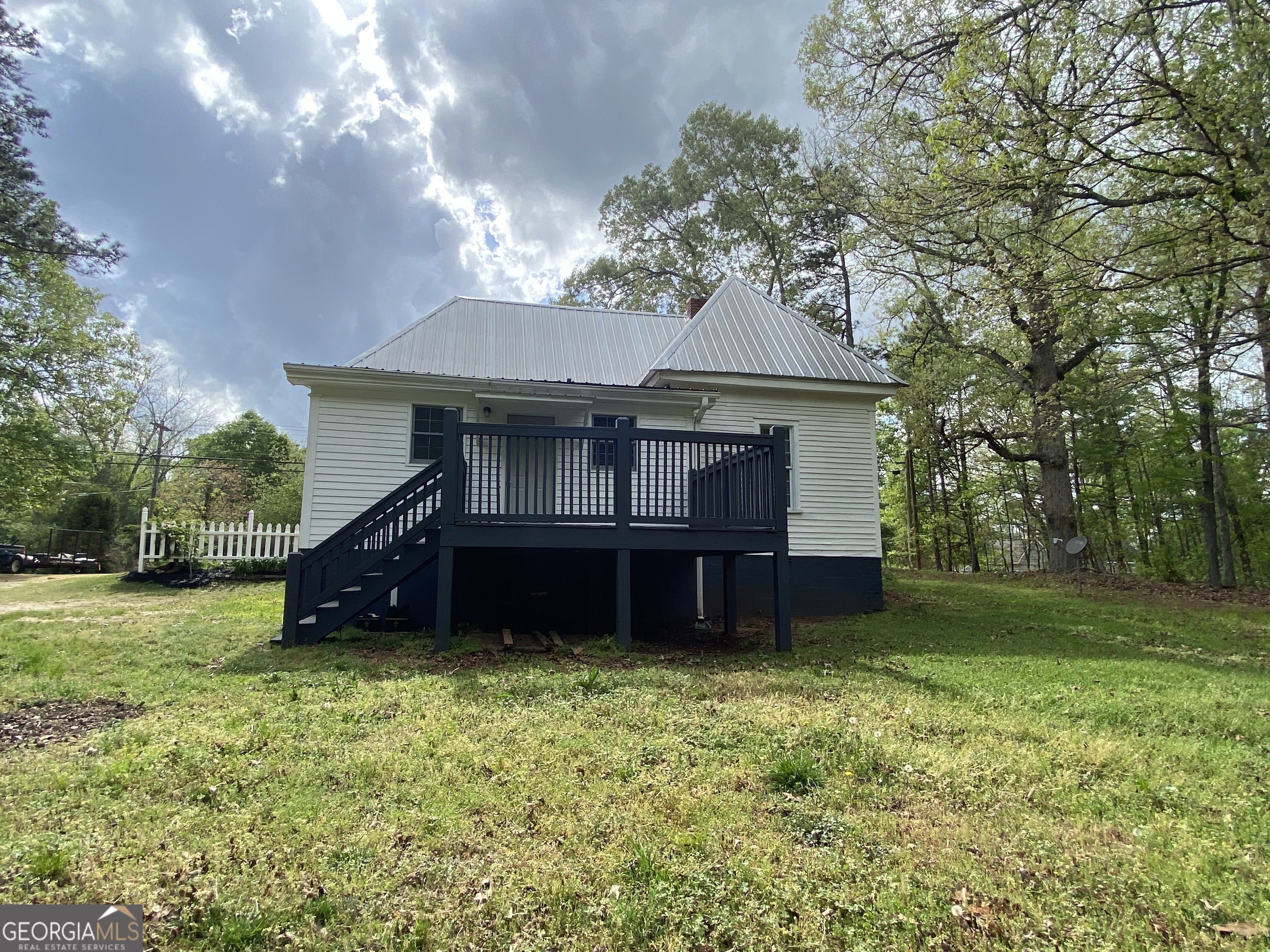 164 Glenn Carrie Road Hull, GA 30646 - Photo 39 of 43 a view of a house with a yard and a tree