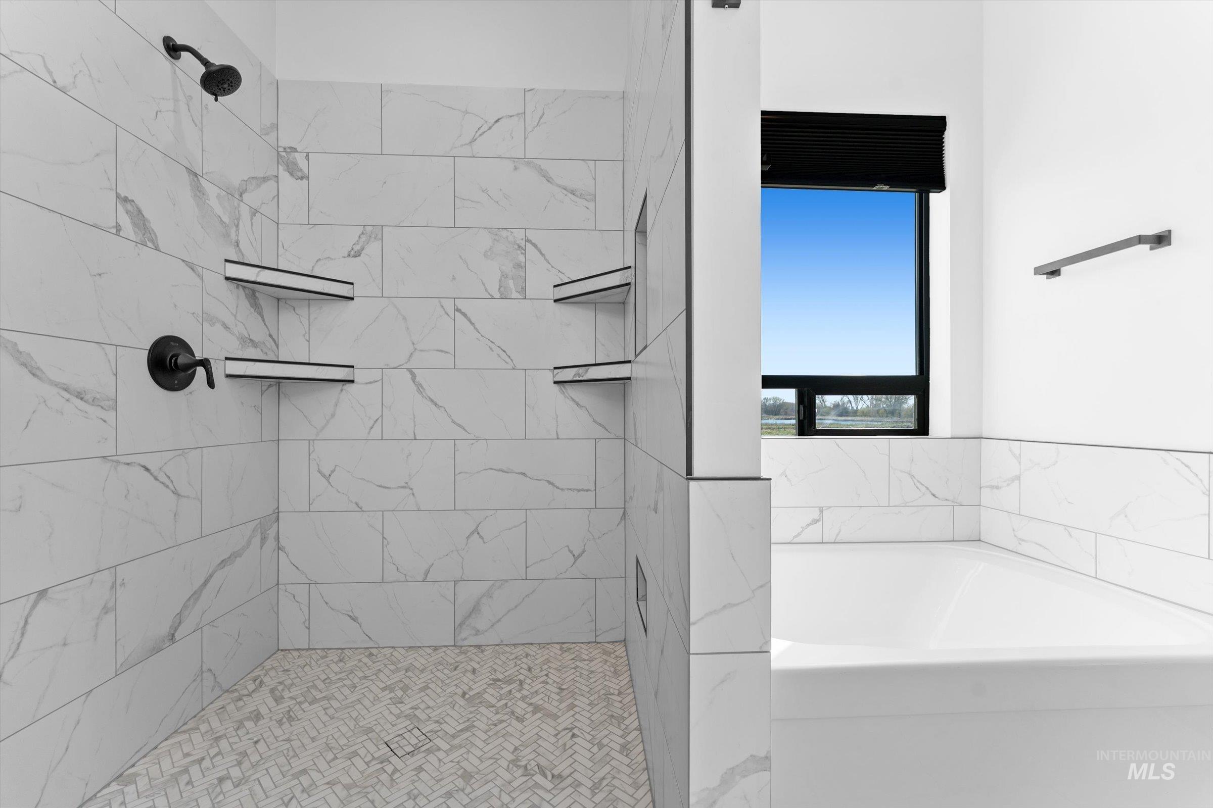 26219 Reed Lane Wilder, ID 83676 - Photo 18 of 35 Bathroom featuring a garden tub and a shower stall