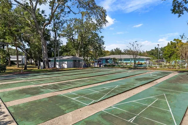 a view of swimming pool with outdoor seating