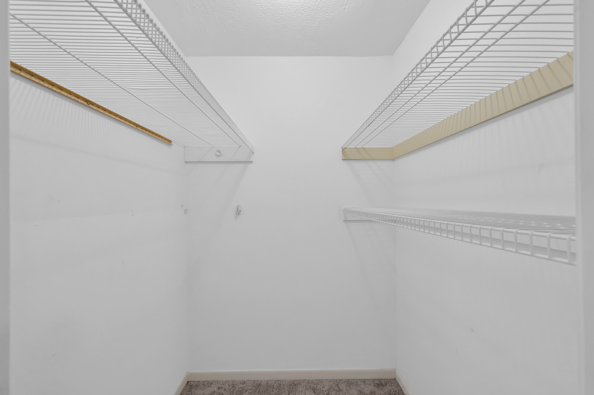 16937 Larkspur Conroe, TX 77385 - Photo 28 of 45 a view of small space with racks on the wall