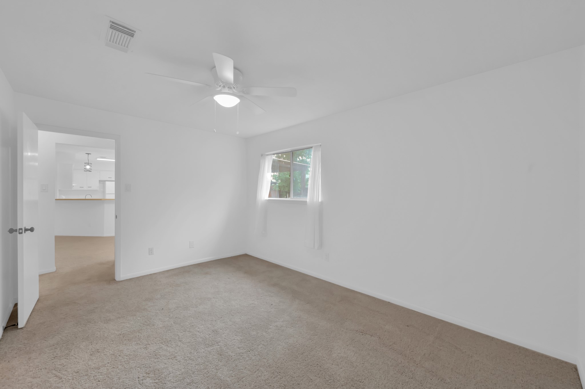 16937 Larkspur Conroe, TX 77385 - Photo 30 of 45 an empty room with a empty space and windows