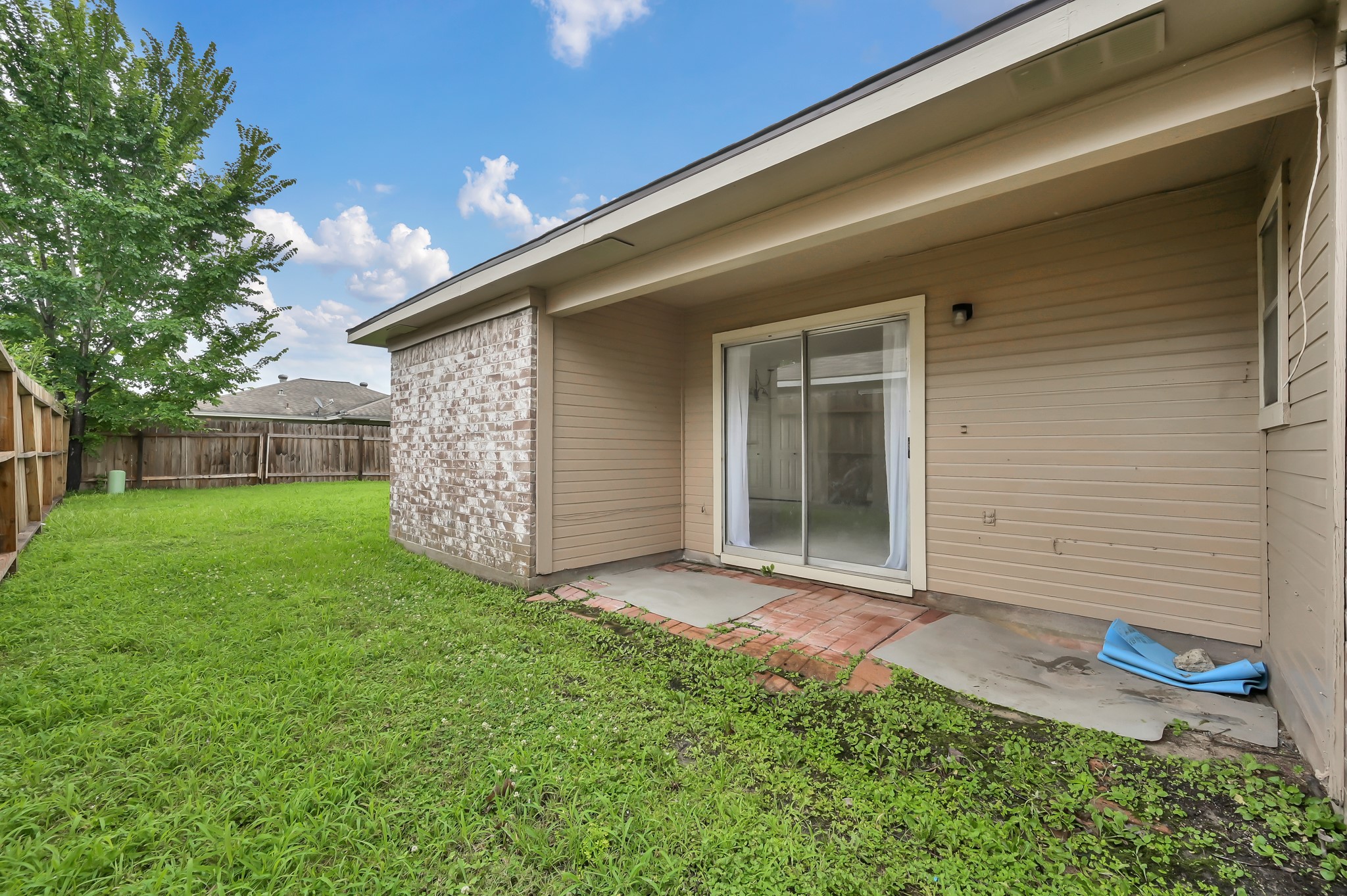 16937 Larkspur Conroe, TX 77385 - Photo 37 of 45 a view of a house with a yard