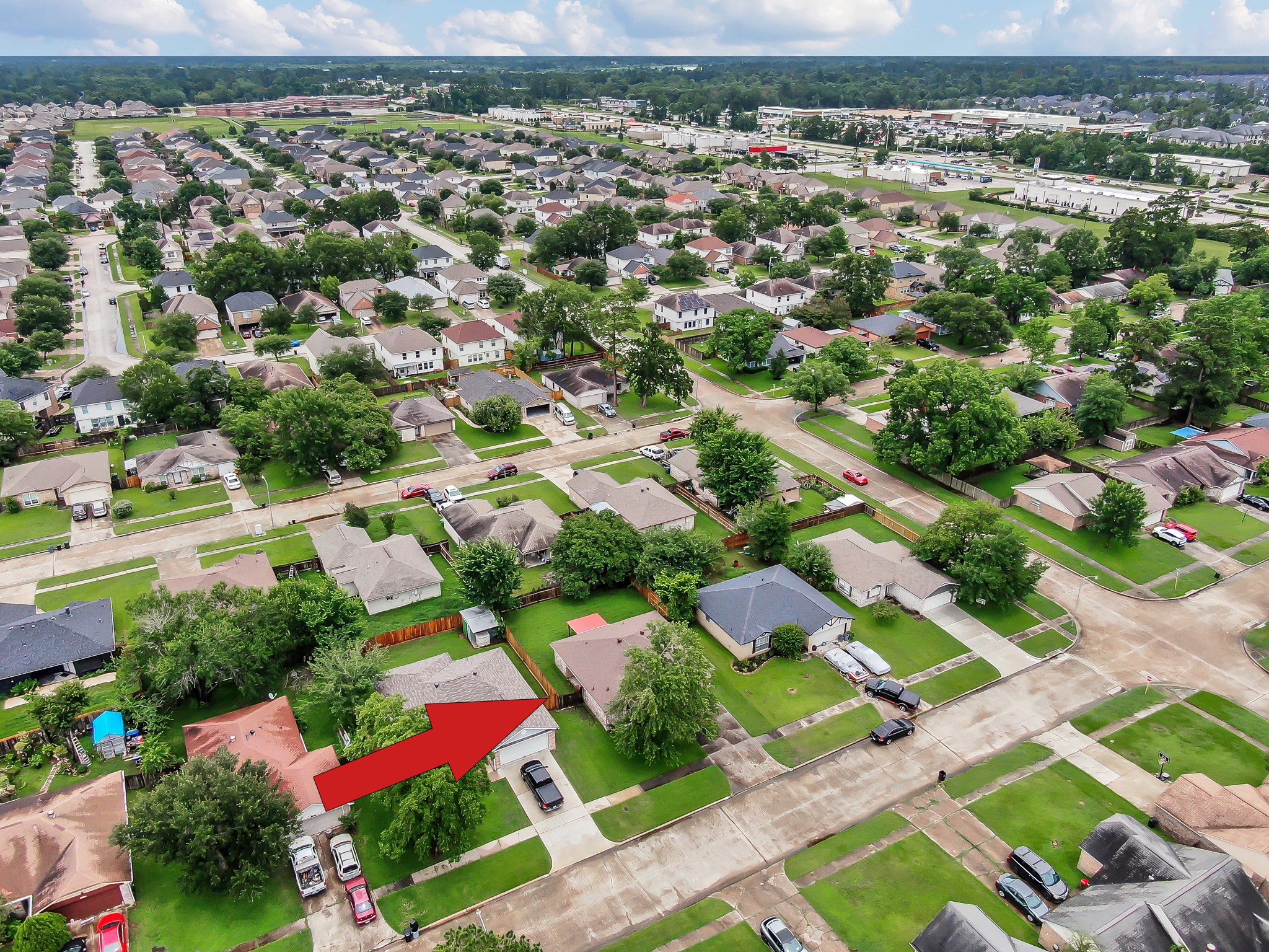 16937 Larkspur Conroe, TX 77385 - Photo 44 of 45 an aerial view of residential houses with outdoor space