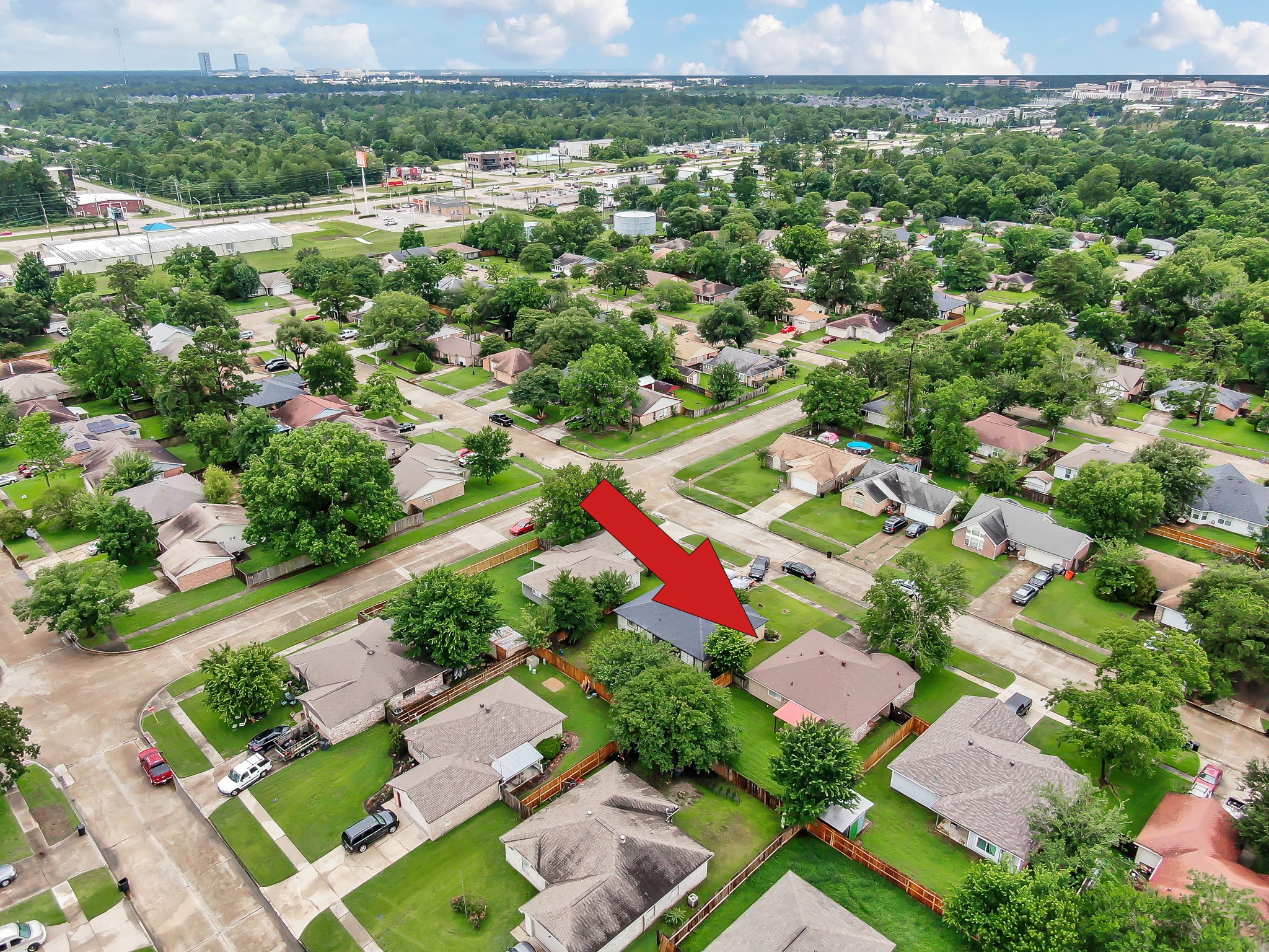 16937 Larkspur Conroe, TX 77385 - Photo 45 of 45 an aerial view of residential houses with outdoor space and street view