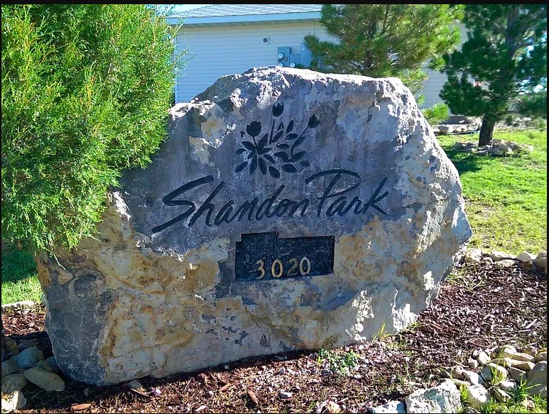 3020 Lerwick Drive Rawlins, WY 82301 - Photo 11 of 11 a view of a stone house with a yard