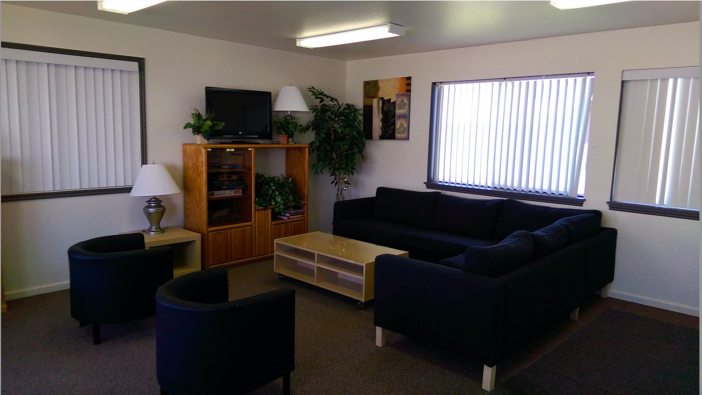 3020 Lerwick Drive Rawlins, WY 82301 - Photo 6 of 11 a living room with furniture and a flat screen tv