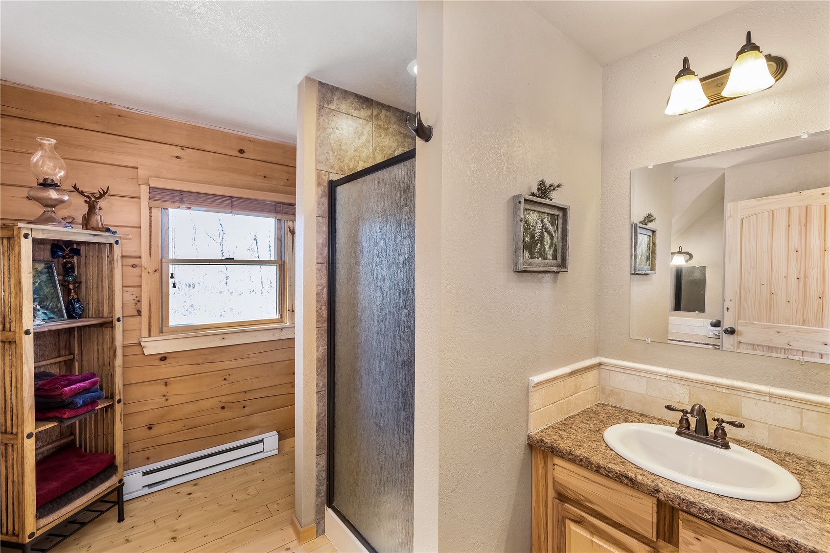 1059 Sheep Ridge Road Fairplay, CO 80440 - Photo 15 of 50 a bathroom with a sink and a mirror