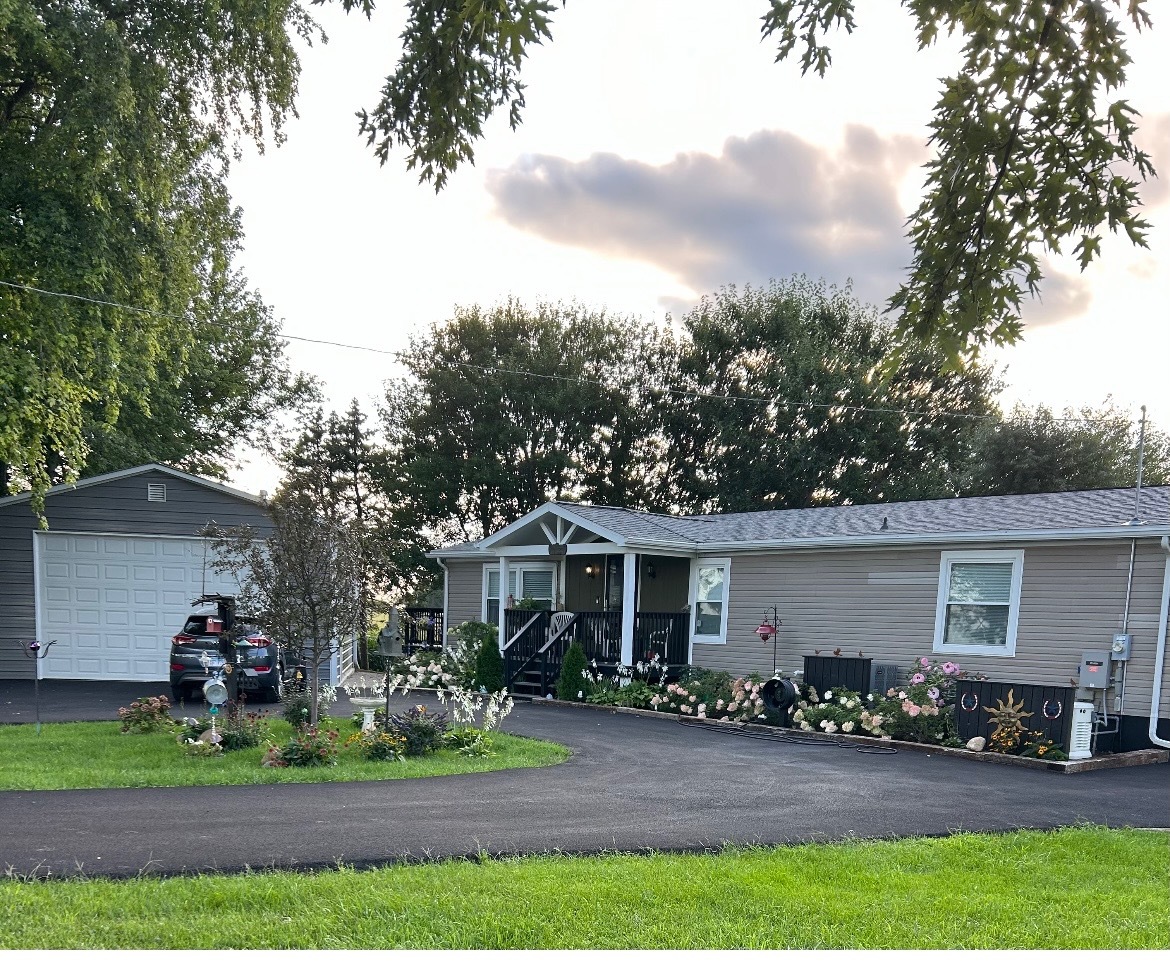 2728 West Brooklyn Road Compton, IL 61318 - Photo 42 of 43 a front view of house with yard outdoor seating and green space