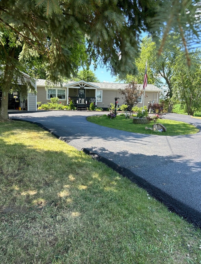 2728 West Brooklyn Road Compton, IL 61318 - Photo 43 of 43 a view of house with yard and swimming pool