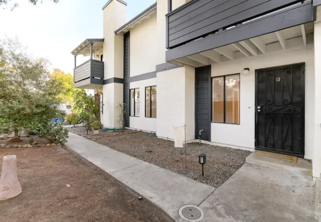 a house view with a outdoor space