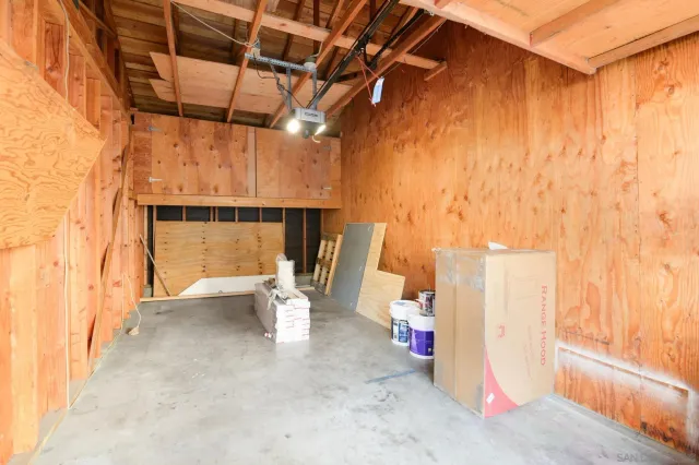 an aerial view of a house with a garden