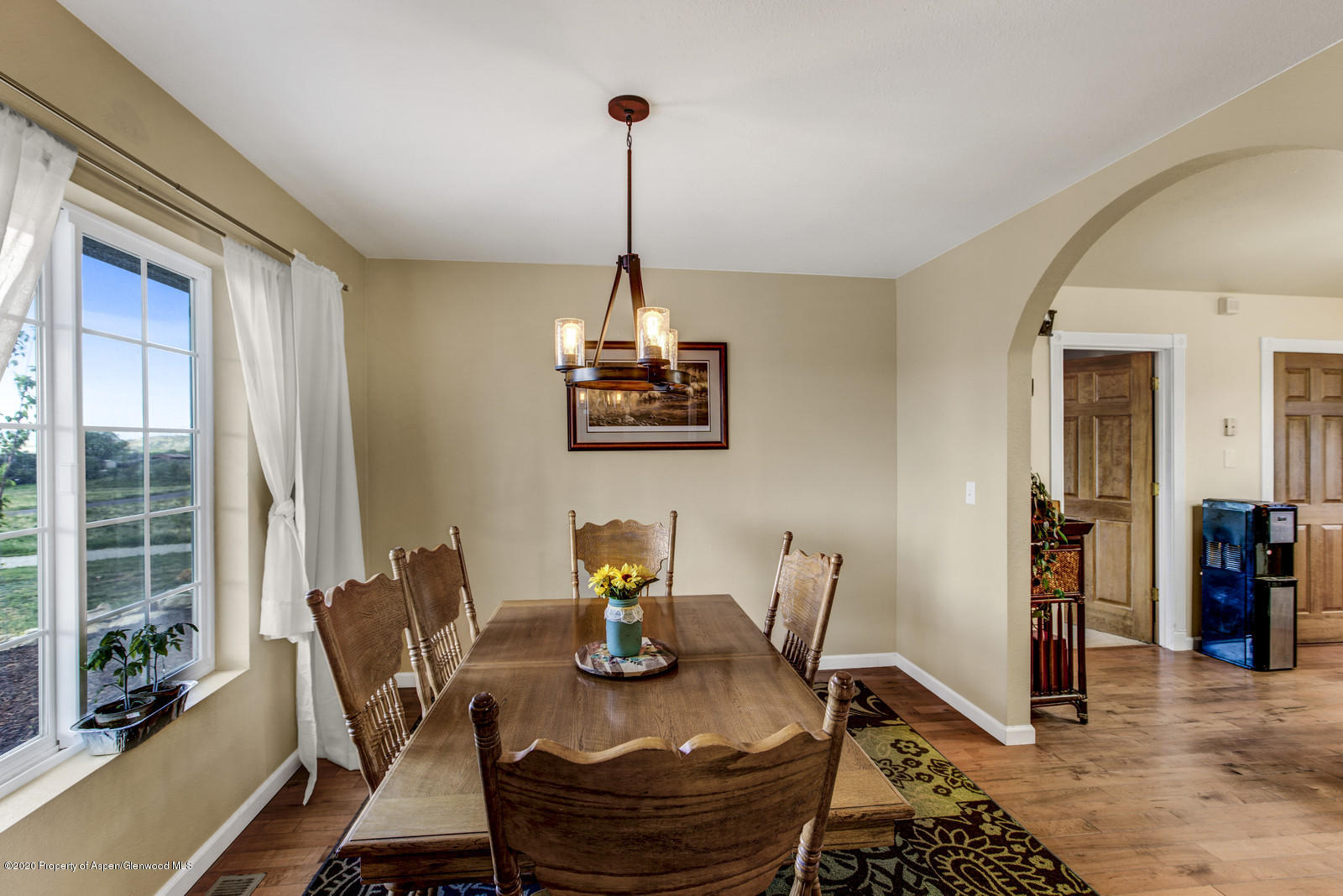 5101 County Road 233 Rifle, CO 81650 - Photo 11 of 26 a view of a dining room with furniture window and outside view