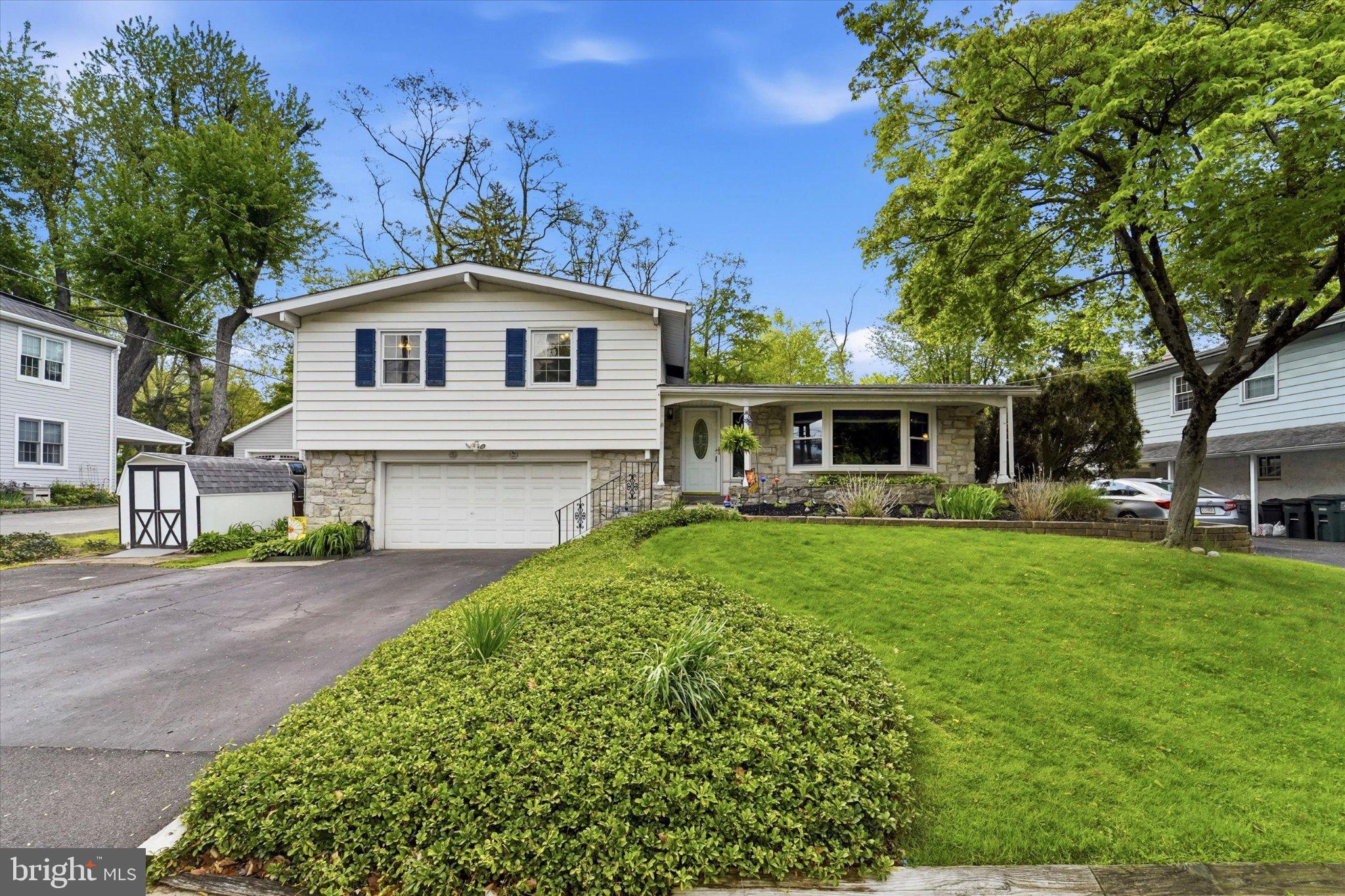 843 Sternermill Road Feasterville-Trevose, PA 19053 - Photo 2 of 49 Charming home with lush greenery.