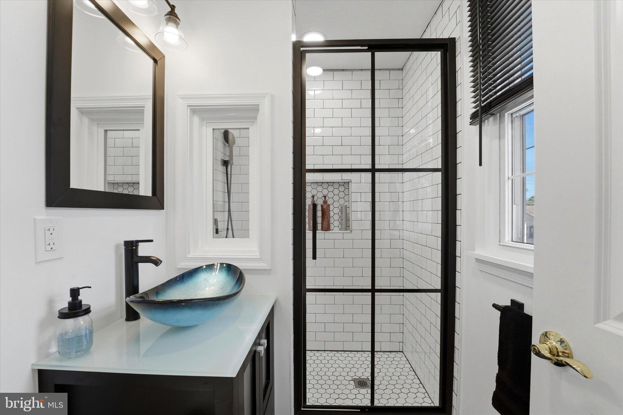 843 Sternermill Road Feasterville-Trevose, PA 19053 - Photo 26 of 49 Sleek modern bathroom with elegant design.