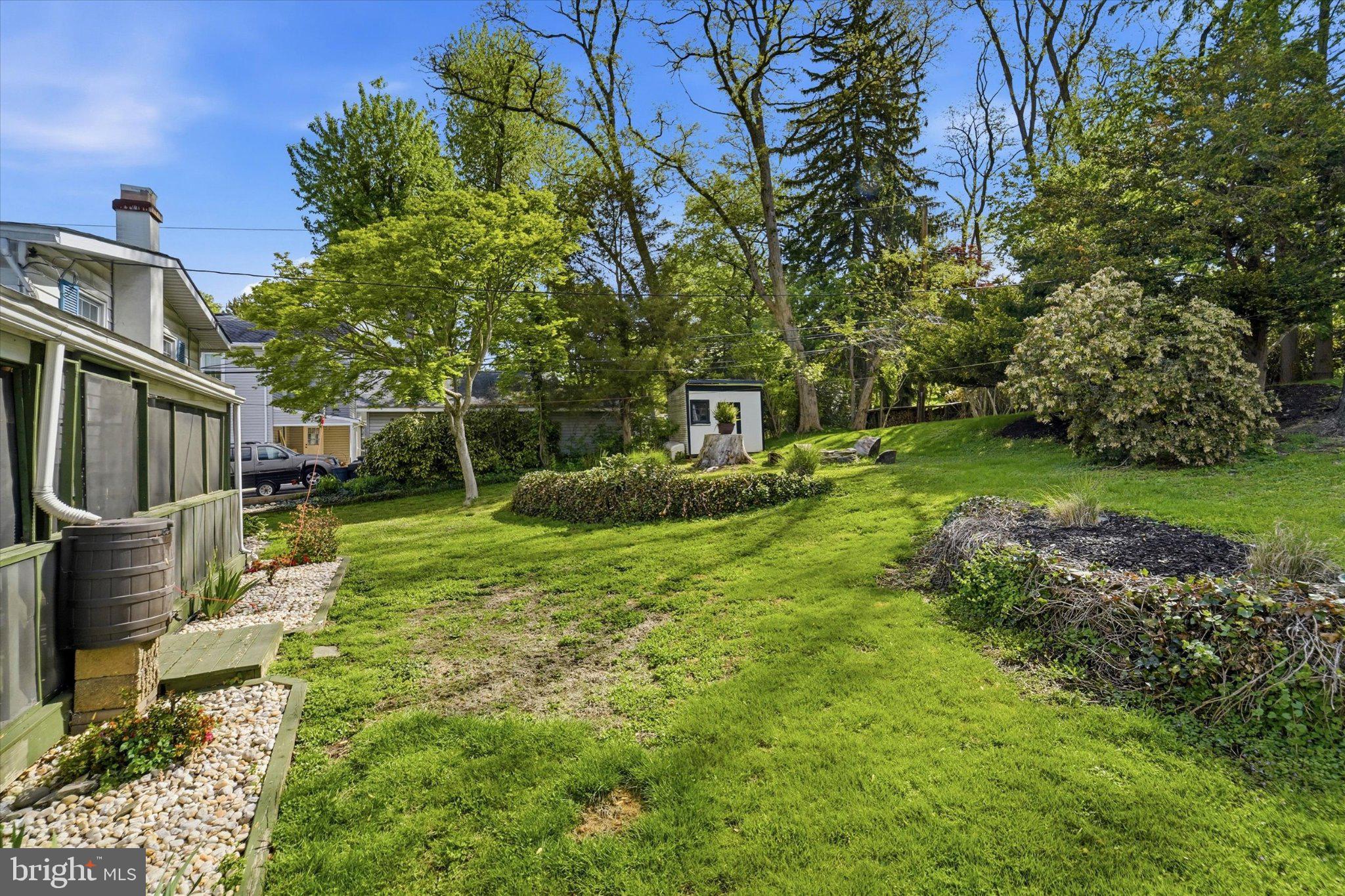 843 Sternermill Road Feasterville-Trevose, PA 19053 - Photo 35 of 49 Lush green oasis with serene landscaping.