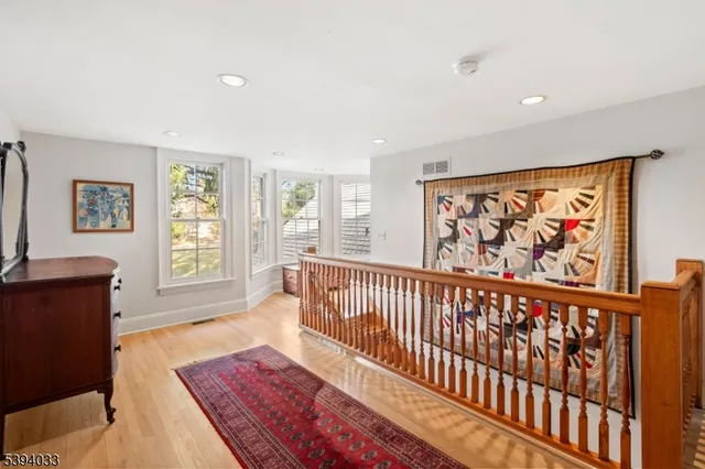 a view of a hallway with windows