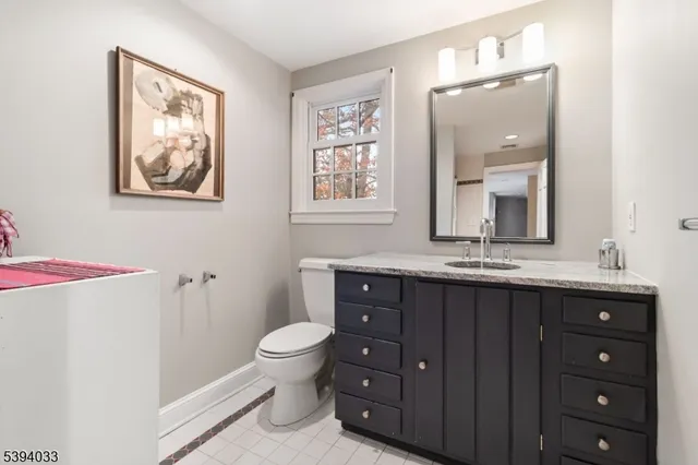 a room with gym equipment and a table