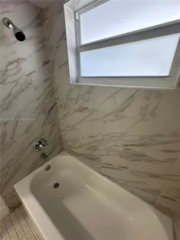 a bathroom with a tub