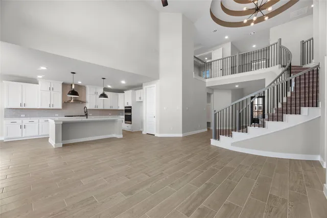 a view of kitchen and kitchen with furniture