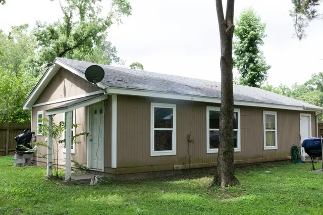 a bathroom with a sink a washer and dryer