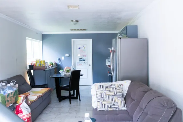 a front view of a house with a garage