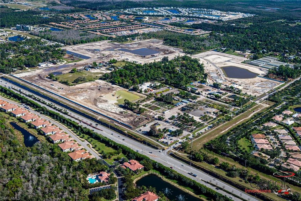 536 Polihale Way Naples, FL 34114 - Photo 7 of 10 an aerial view of residential houses with yard