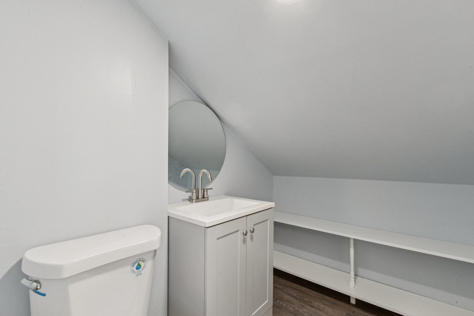 8846 Austin Avenue Morton Grove, IL 60053 - Photo 20 of 35 a bathroom with a sink toilet and vanity