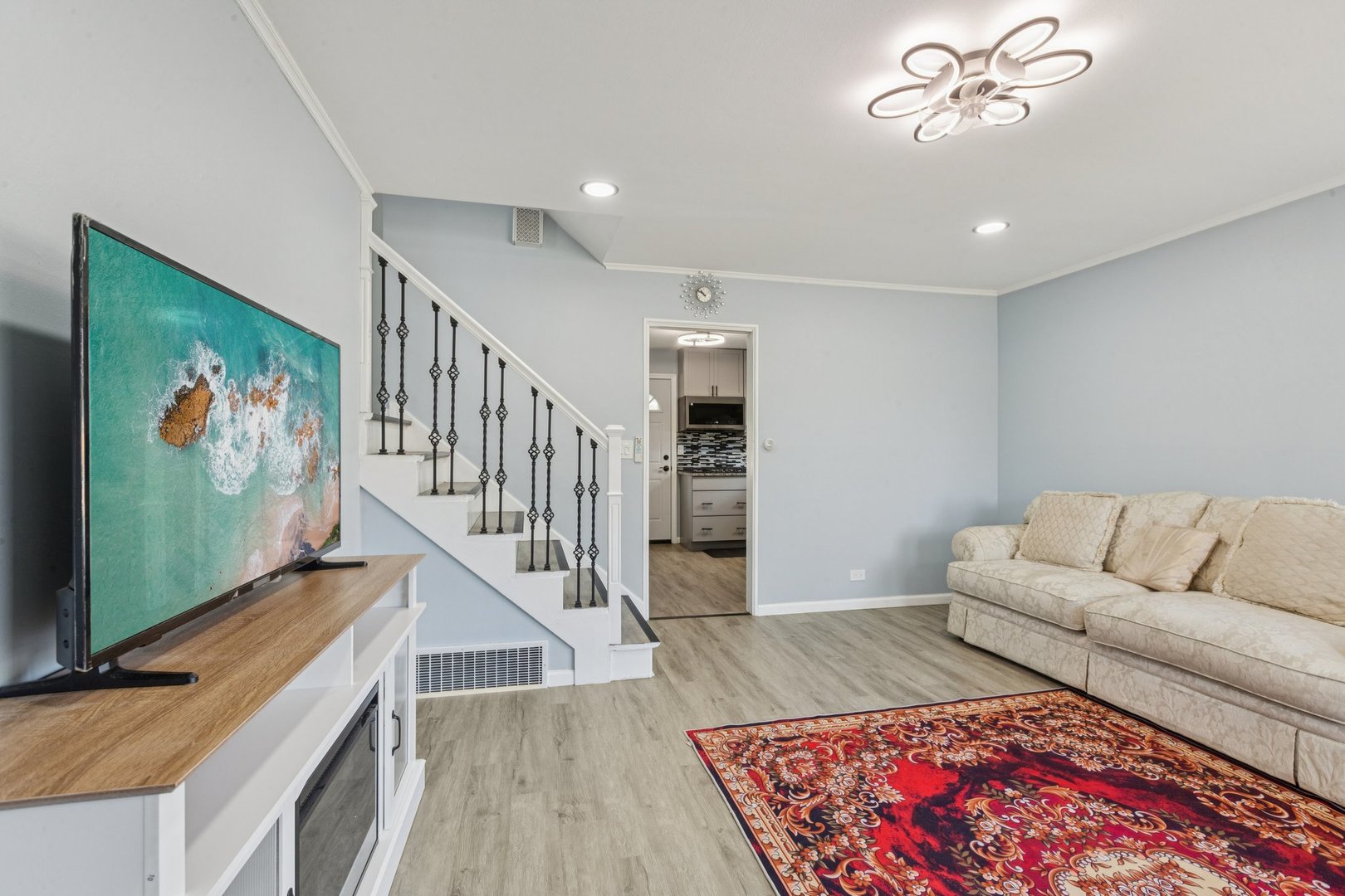 8846 Austin Avenue Morton Grove, IL 60053 - Photo 3 of 35 a living room with furniture and wooden floor