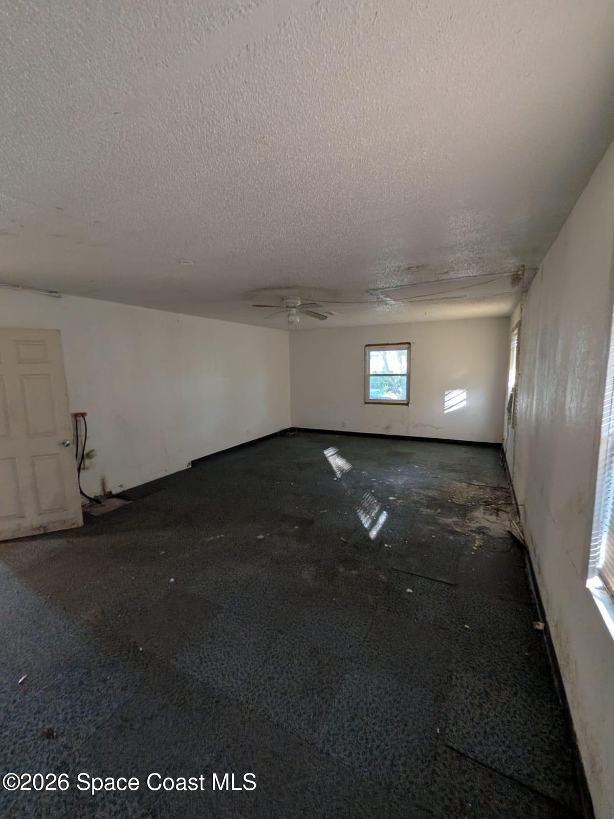 545 Easy Street Merritt Island, FL 32953 - Photo 7 of 9 a view of empty room