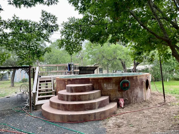 a view of house with outdoor space