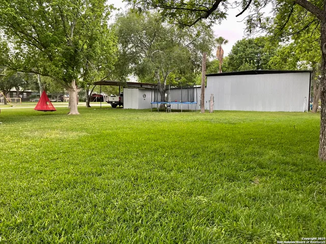 a view of outdoor space and yard