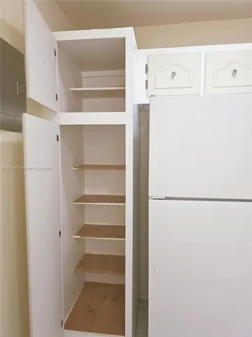 a view of entryway with livingroom