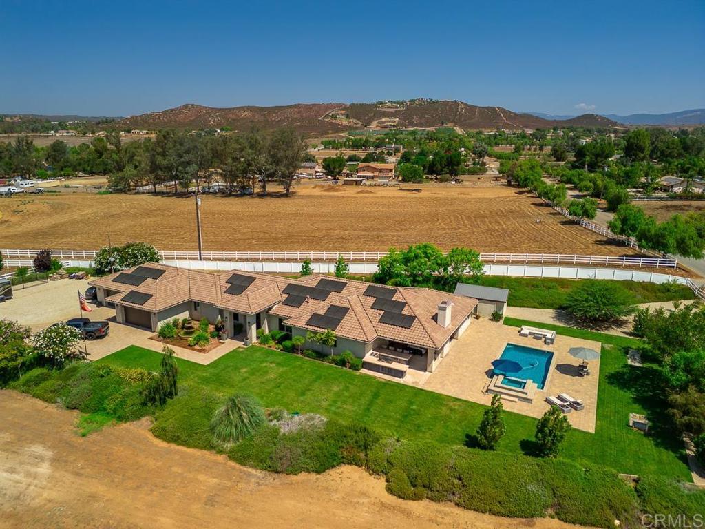 a view of a lake with a yard