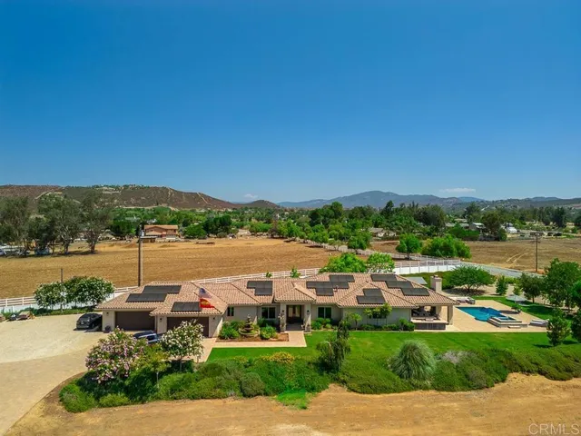 a view of a lake with houses with outdoor space