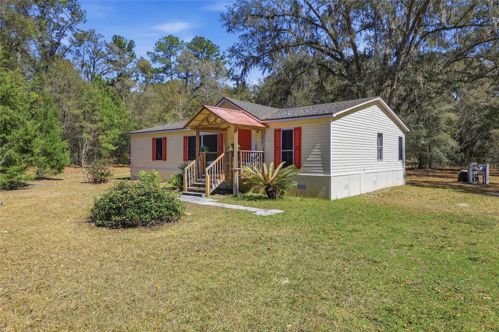 1131 Southwest 166th Street Newberry, FL 32669 - Photo 3 of 30