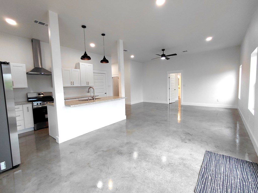 508 West Rainey Street Mason, TX 76856 - Photo 5 of 25 a large kitchen with cabinets