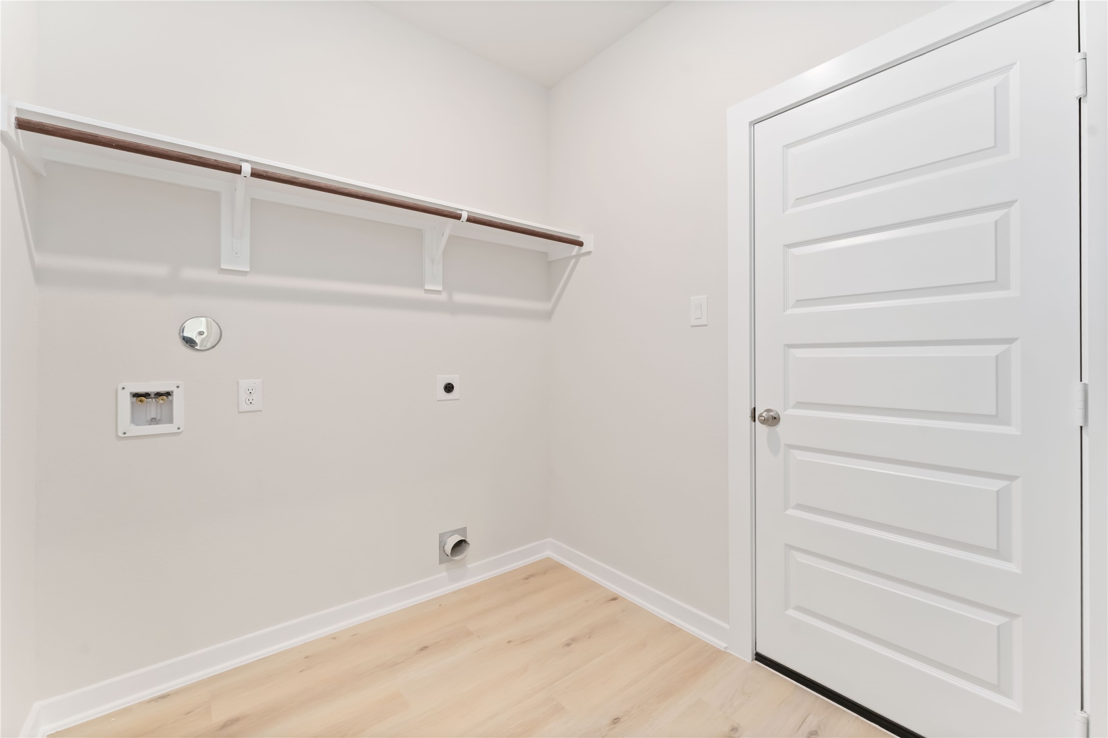 25992 Liberation Road Cleveland, TX 77328 - Photo 11 of 27 a view of an empty walk in closet