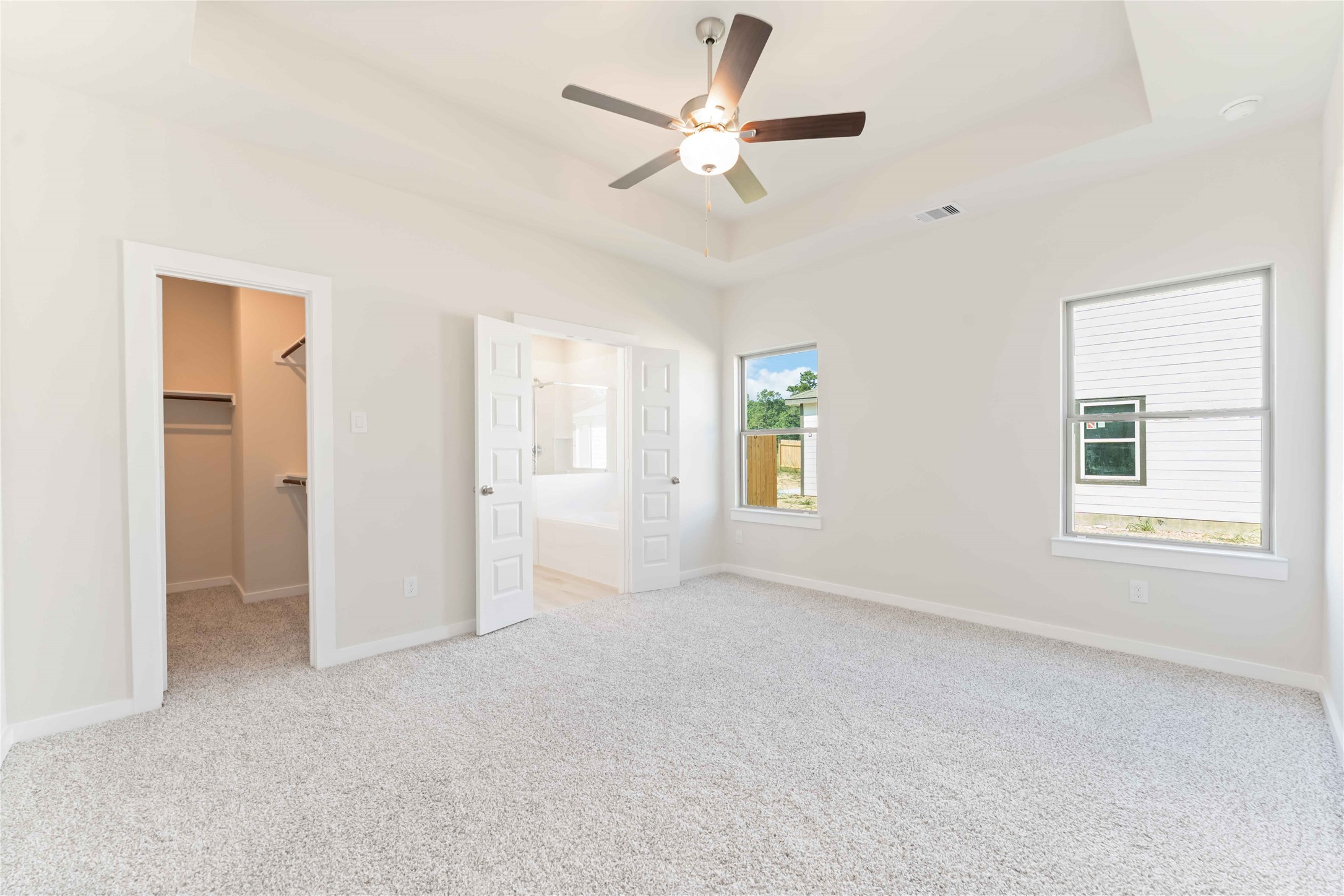 25992 Liberation Road Cleveland, TX 77328 - Photo 12 of 27 a view of an empty room with a window