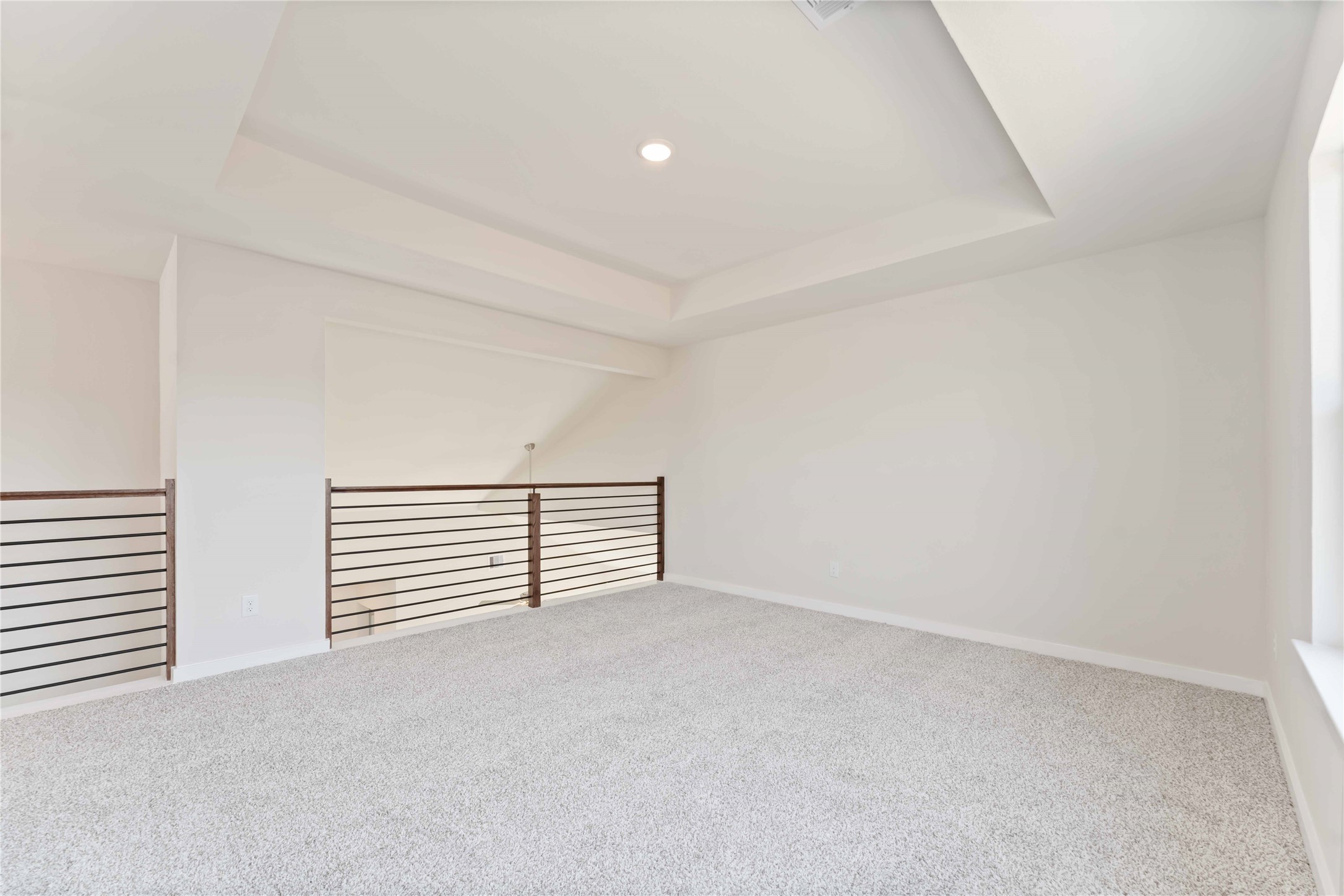 25992 Liberation Road Cleveland, TX 77328 - Photo 19 of 27 an empty room with windows