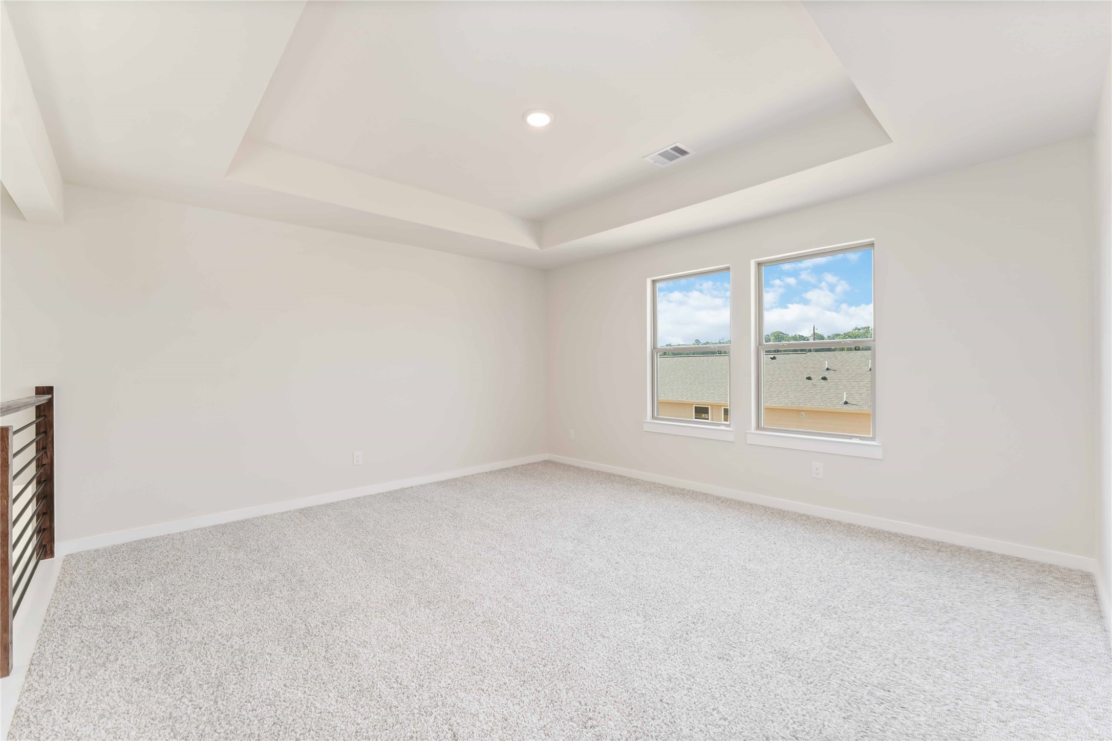 25992 Liberation Road Cleveland, TX 77328 - Photo 20 of 27 an empty room with windows