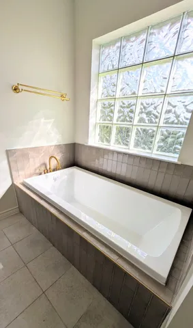 a view of an empty room with empty shelves