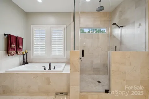 a bathroom with a bathtub and a sink