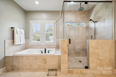 a bath tub sitting next to a window