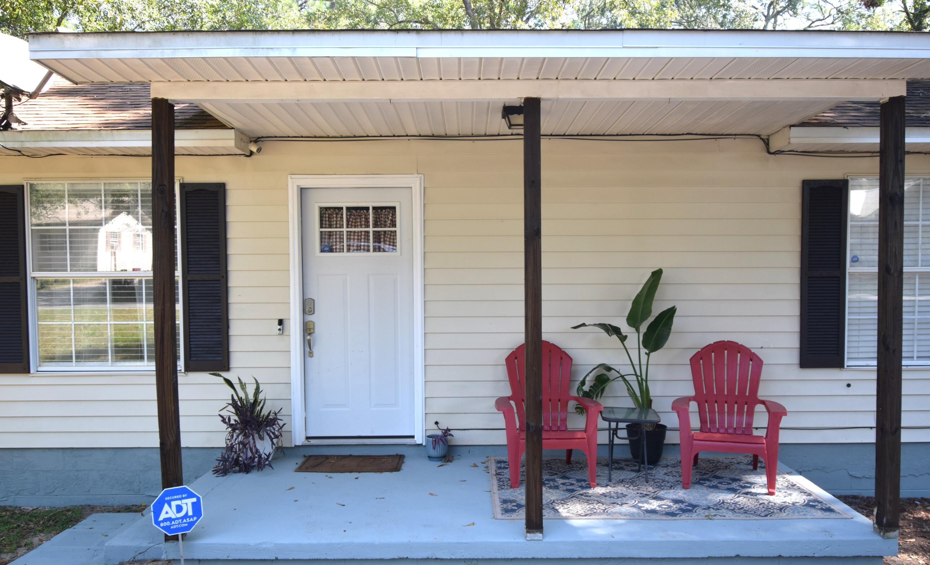 406 Cooper Street Crestview, FL 32539 - Photo 2 of 32 a view of entryway with wooden floor