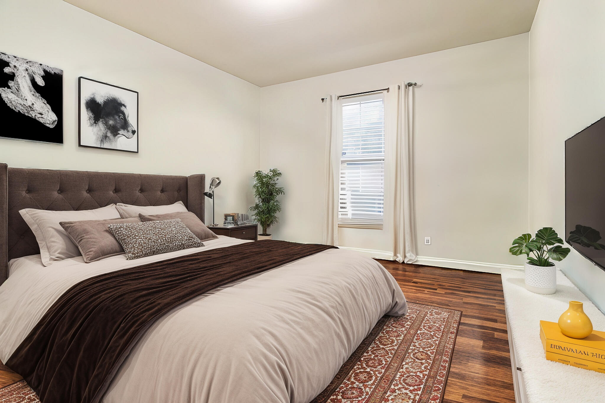 406 Cooper Street Crestview, FL 32539 - Photo 21 of 32 a bedroom with a bed and painting on the wall