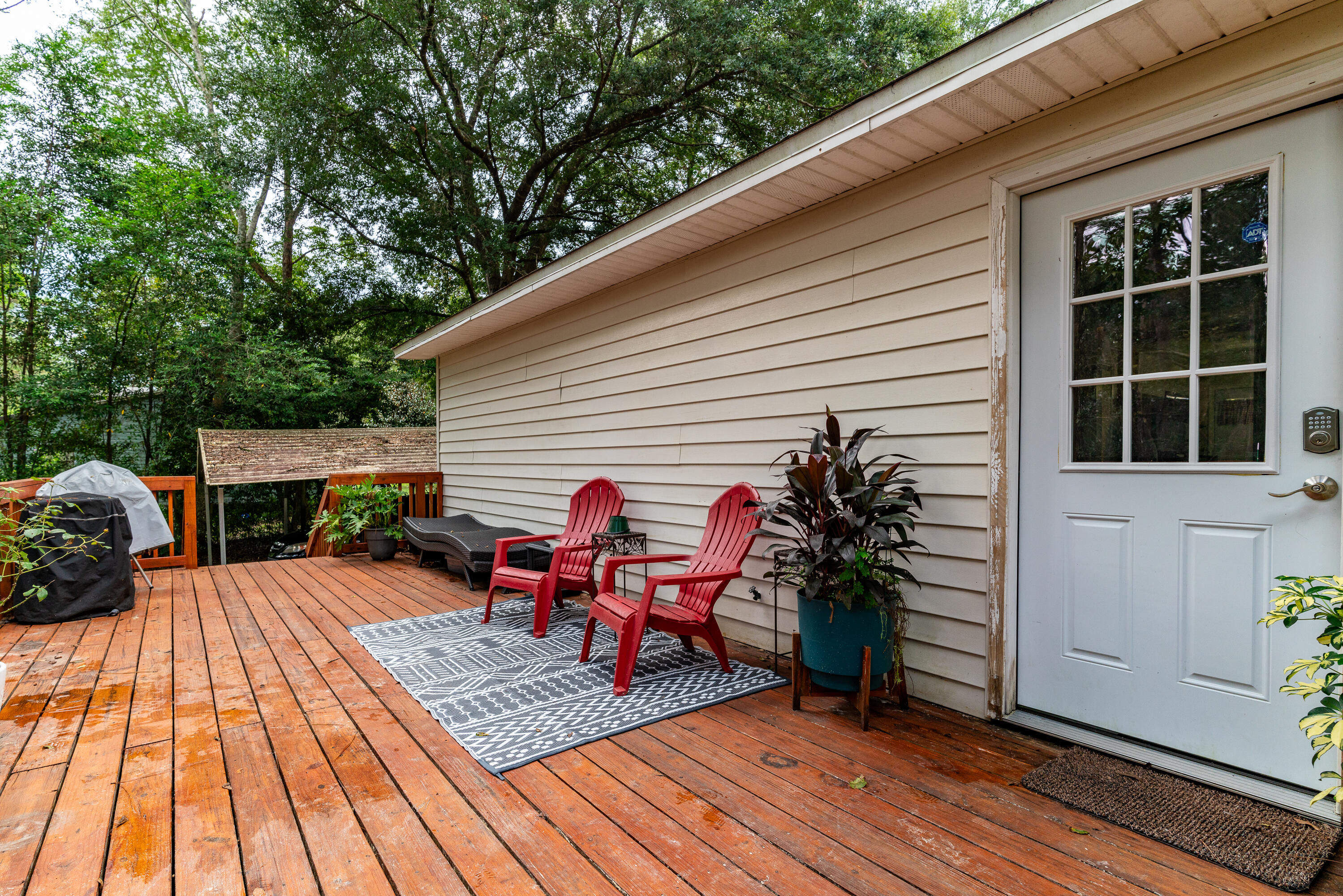 406 Cooper Street Crestview, FL 32539 - Photo 22 of 32 a view of a two chairs in the balcony