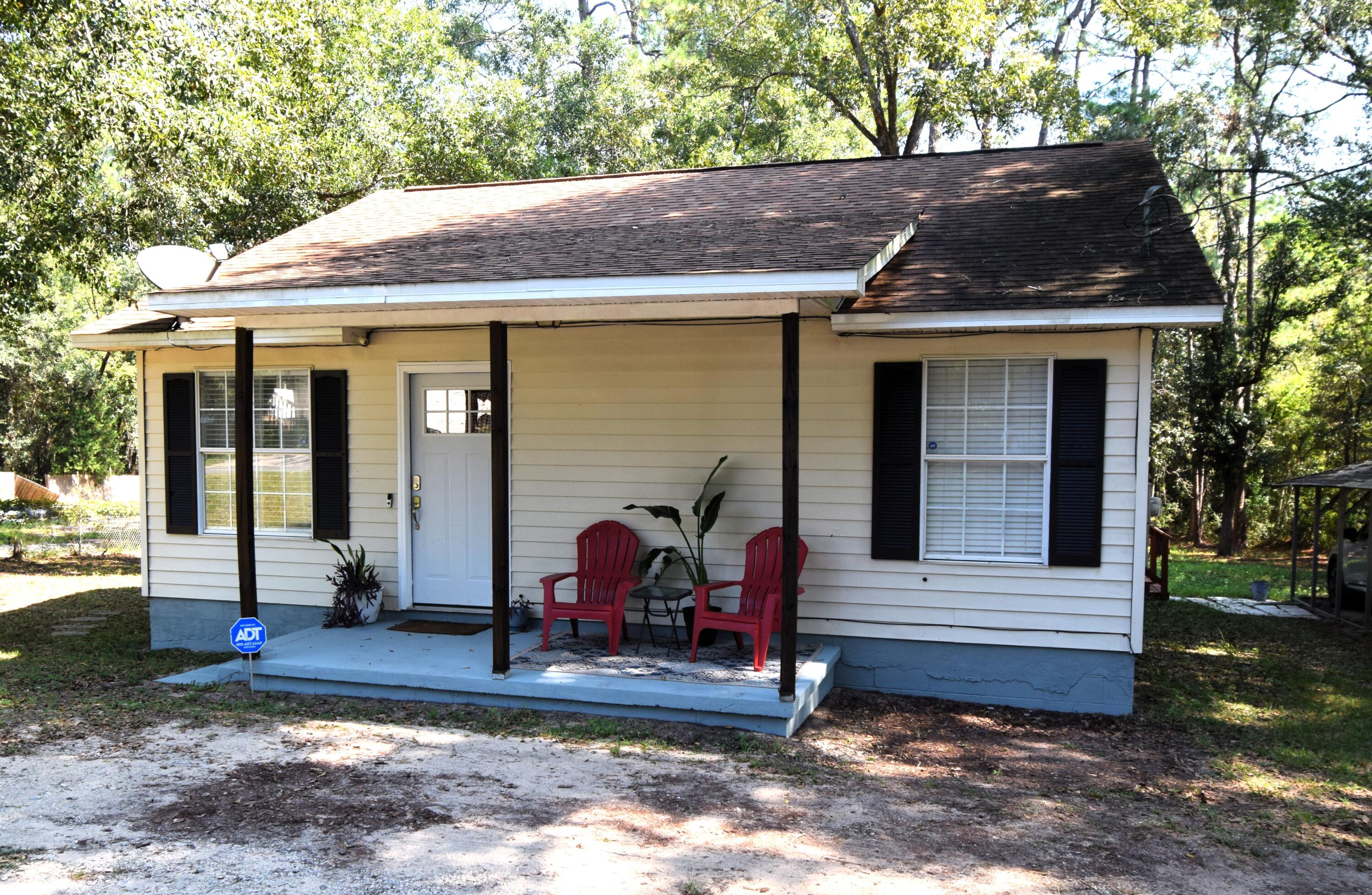 406 Cooper Street Crestview, FL 32539 - Photo 3 of 32 a view of house with outdoor space