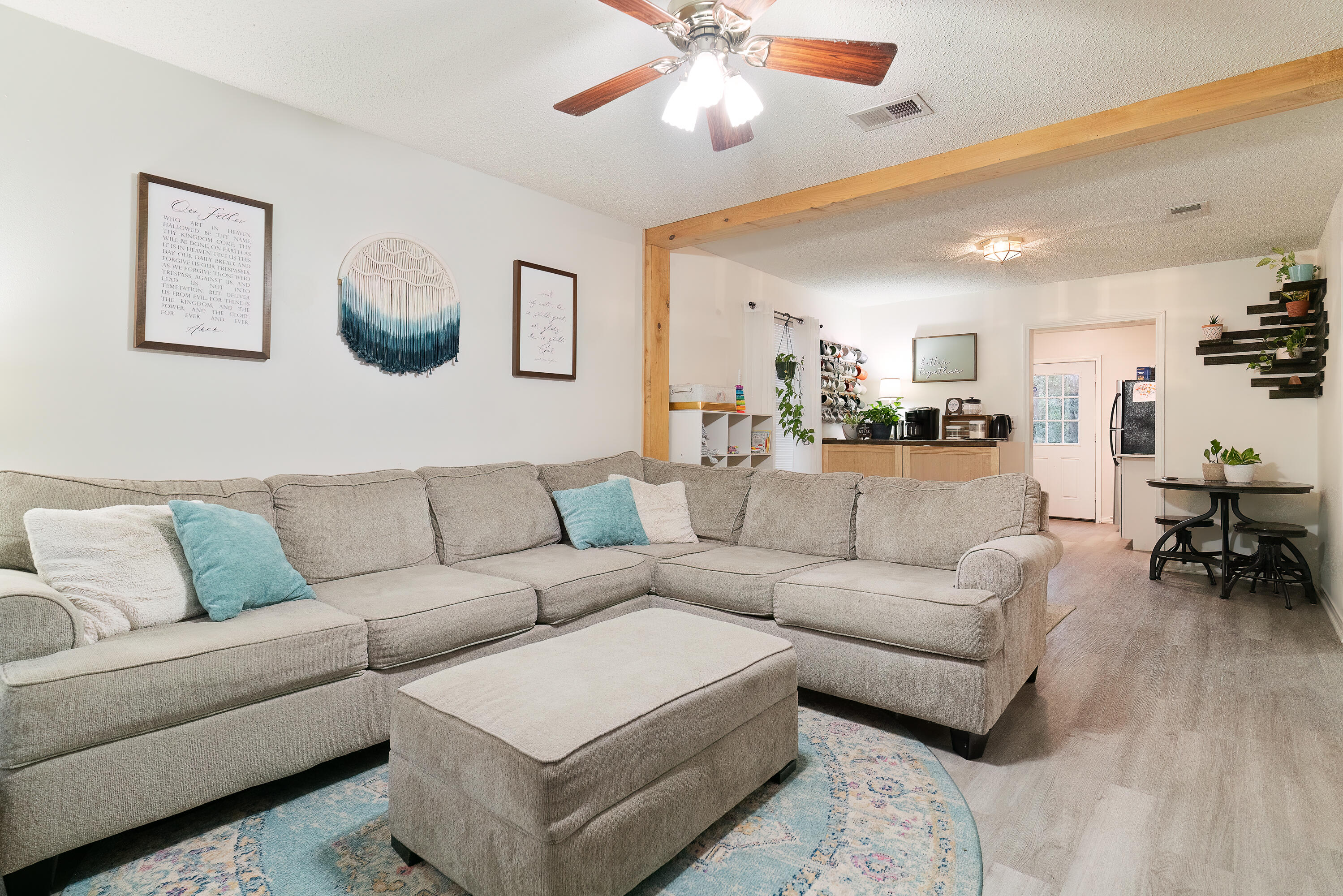 406 Cooper Street Crestview, FL 32539 - Photo 8 of 32 a living room with furniture and a large window