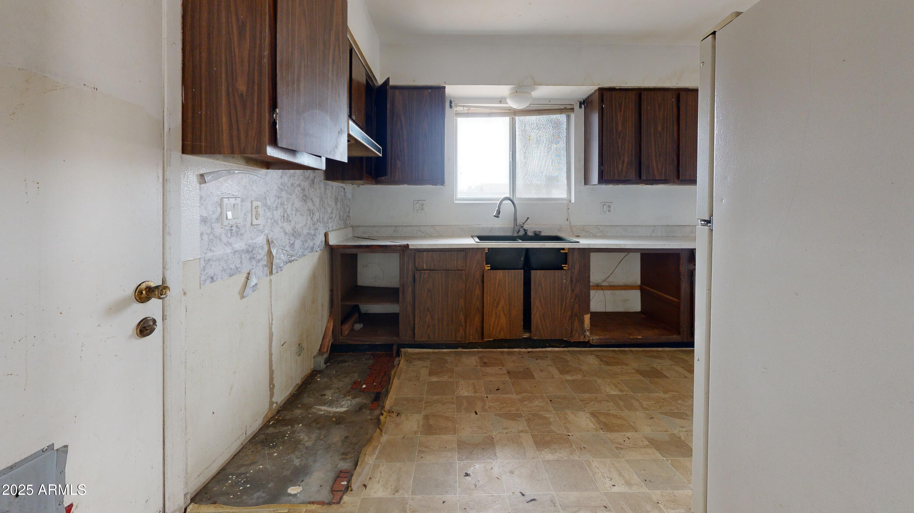 2351 South Royal Palm Road Apache Junction, AZ 85119 - Photo 6 of 21 a bathroom with a sink and a mirror